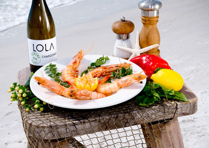 Enjoy cocktails with your toes in the sand on Anna Maria Island